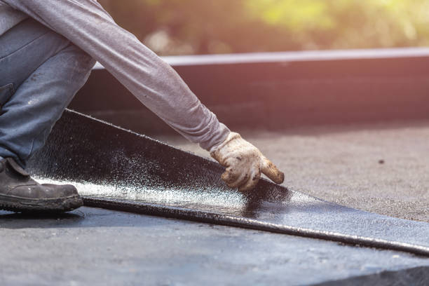 Professional Emergency Waterproofing technician working in Athens, OH